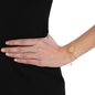 The Simple Reflection gold plated bracelet with discus motif-