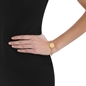 The Simple Reflection gold plated bangle with discus motif-