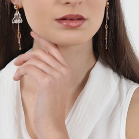 Winged Spirit long bicolor silver dangle earrings with wing motif-