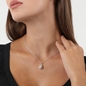 Archaics short silver necklace with carved drop-