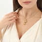 Archaics short gold plated necklace with anthemion and carved drop-