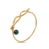 Fluidity Color brass bangle with 18K yellow gold plating, spiral eternity and green malachite sphere motifs 