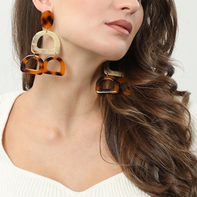 Impress Me large dangle earrings with irregular motifs-
