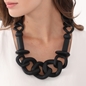 Impress Me II necklace with irregular matte black motifs -